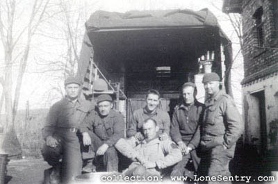 [42nd Tank Battalion, 11th Armored Division: GIs with Truck]