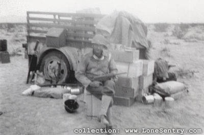 [11th Armored Division Training: Major Davenport guarding the rations]