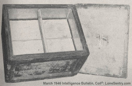 [The strongly constructed box shown above was one of 30 filled with supplies and found buried in one area in France.]