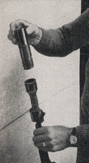 [Figure 14. Grenade launcher, showing method of unscrewing it to aid in cleaning.]