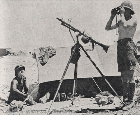 [Figure 36. M.G. 34 on antiaircraft mount, using drum feed.]