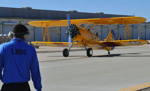 WWII U.S. Navy N3N Canary trainer biplane on the taxiway at Naval Air Station North Island in 2011.