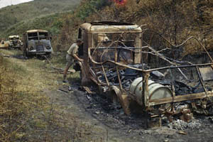 Three burnt out German trucks destroyed by Allied forces in Italy, 1944