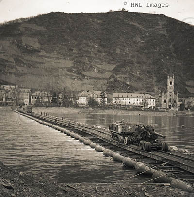 [WWII Photograph: First heavy artillery across Rhine River. Copyright HWL Images.]