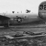 After being transported by rail & barge from Budge Budge, India, gasoline was then transported by Consolidated C-109's of the 7th Bomb Group, 10th Air Force from Kurmitola, India to Kunming, China. Here a C-109 is being loaded directly from a gasoline revetment outlet at Kurmitola, India. 6 September 1944.