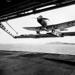 A Vought SB2U-2 Vindicator from the U.S. Navy scouting squadron VS-72 is raised on the elevator of the aircraft carrier USS Wasp (CV-7) in June 1940. (U.S. Navy Photograph.)