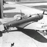 A squadron mascot guards a Northrop A-17 attack bomber of the 74th Attack Squadron, 16th Pursuit Group. (U.S. Air Force Photograph.)